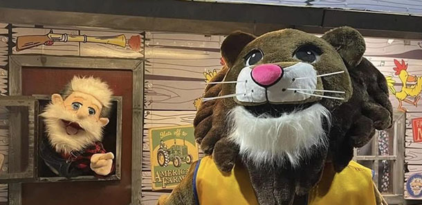 Aurora Lions Mascot with Granpa Crachet.